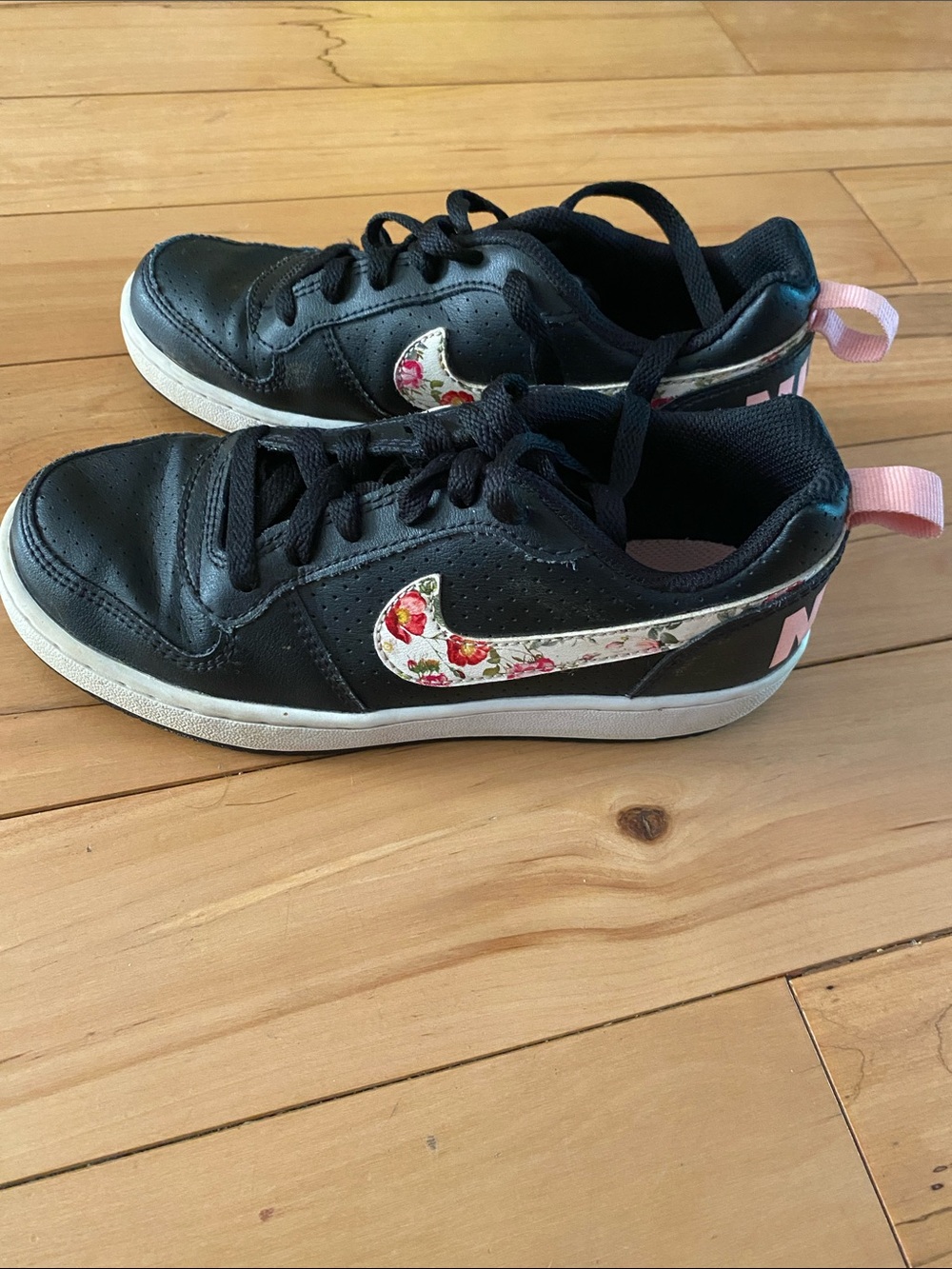 Nike Kids Black Sneakers with Floral Swoosh and Pink Heel Tab